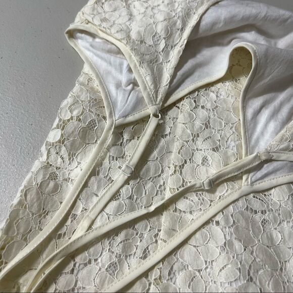 aritzia Talula Shibuya Crisscross Lace Ruffle Hem Eyelet Mini Dress - Picture 9 of 11